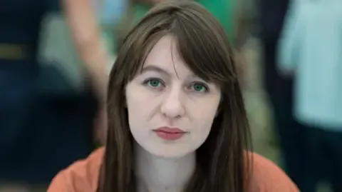 Sally Rooney claims she is unable to visit the UK due to arrest fears