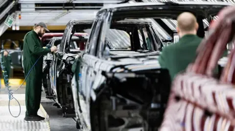 Jaguar Land Rover Vendor Network Staff Allegedly Told to Register for Government Benefits, Union Claims